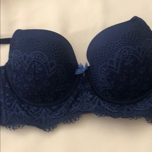 Beautiful navy blue lace bra.